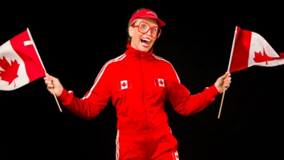 Lady waving Canadian Flags