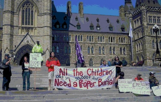 Kevin Annett (left) with Mohawk natives on Parliament Hill, summer 2012